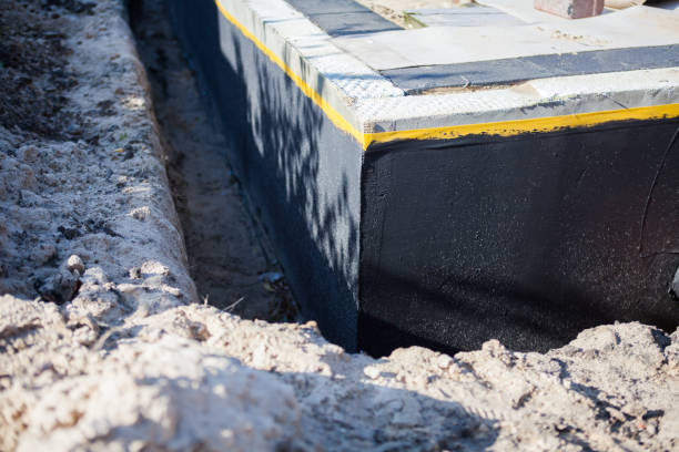 Professional Waterproofing technician working in Wantagh, NY